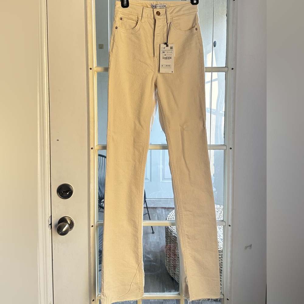 Zara Cream Jeans with small slits at the bottom, perfect fall transition piece.